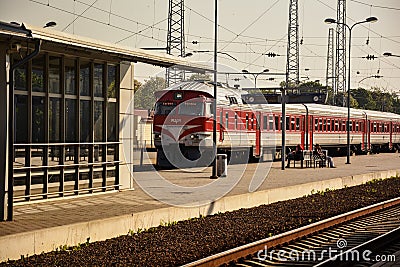 Train on the railway station Editorial Stock Photo