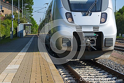 Train ready to be shipped stands on rails leaving far beyond the horizon, on a summer Stock Photo