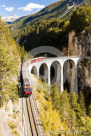 train on Rhaetian Railway, Landwasserviadukt, canton Graubunden Editorial Stock Photo