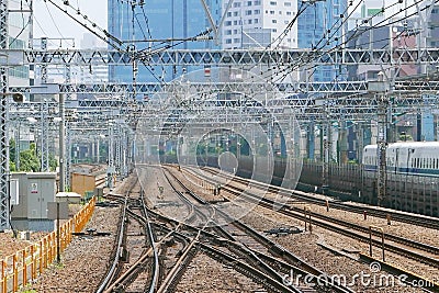 Train track, cable, building, Tokyo cityscape Stock Photo