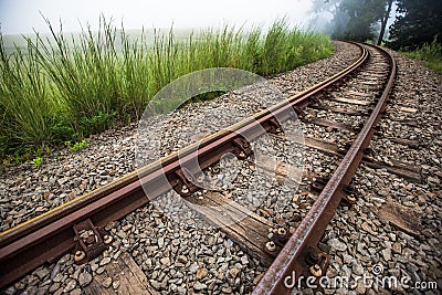 Train Tracks curves to the left Stock Photo