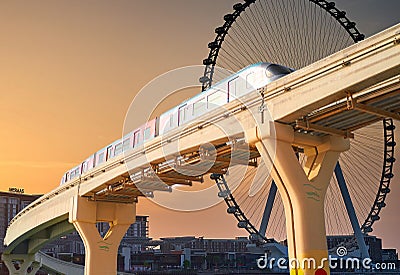 a train travels on a monorail in Dubai, United Arab Emirates Stock Photo