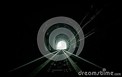 Train tunnel. Old railway in cave. Hope of life in the end of the way. Railroad of locomotive train in Thailand. Old architecture Stock Photo