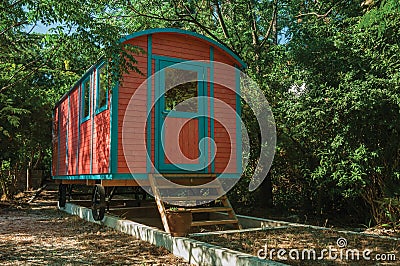 Train wagon decorating garden in a farm Stock Photo