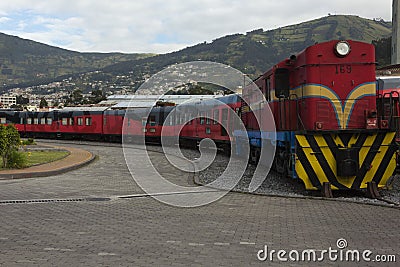 Train waiting in Cimbacalle train station Editorial Stock Photo