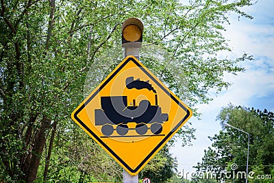 Train warning sign, railway crossing Stock Photo