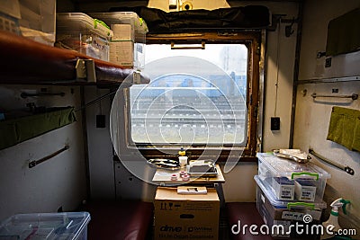 Train with wounded children and fired refugee families from Mariupol departed in Lviv. Medical equipment in train Editorial Stock Photo