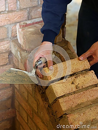 Trainee bricklayer Stock Photo