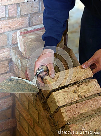 Trainee bricklayer Stock Photo