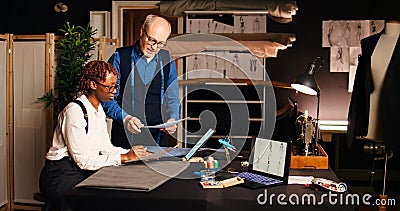 Trainee learning to craft clothing items Stock Photo