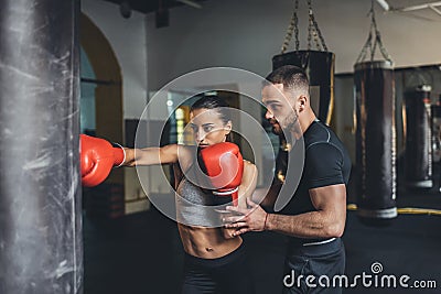 Trainer and female boxer Stock Photo