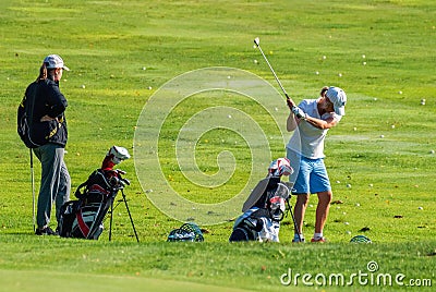 Training of golfers. Editorial Stock Photo