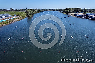 training of rowers on kayaks and canoes on rowing channel. top view Editorial Stock Photo