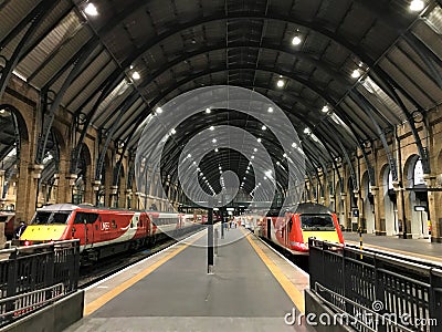 Trains and platforms at King`s Cross rail station, London, UK Editorial Stock Photo