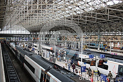 Trains at platforms Manchester Piccadilly station Editorial Stock Photo