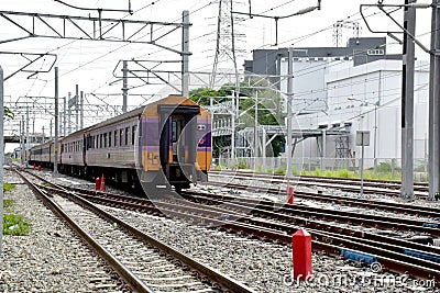 The Trains running on the train tracks to the station in Thailand Editorial Stock Photo