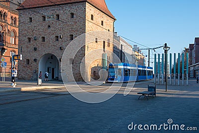 A tram drives by the Steintor city gate Editorial Stock Photo