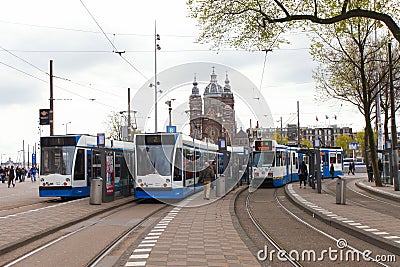 Tram (Local light rail transportation) heading to Amsterdam central station Editorial Stock Photo