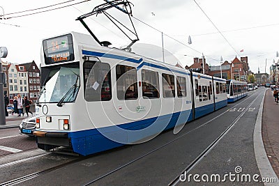 Tram (Local light rail transportation) heading to Amsterdam central station Editorial Stock Photo