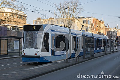 Tram 19 At The Middenweg Street Early In The Morning At Amsterdam The Netherlands 202019, amsterdam, architecture, city, cityscape Editorial Stock Photo