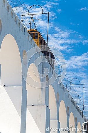 Tram rides on Carioca aqueduct Stock Photo
