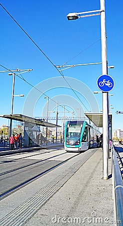 Tram tracks in La Meridiana with tram in the background, Barcelona Editorial Stock Photo