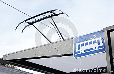 Tram at tram stop Stock Photo