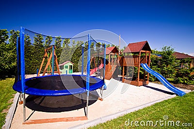 Trampoline in children's playground Stock Photo