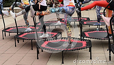 Trampoline training on the street. Orenburg, Russia, 02.08.19. sports performances, jumps. Outdoor fitness training. Editorial Stock Photo