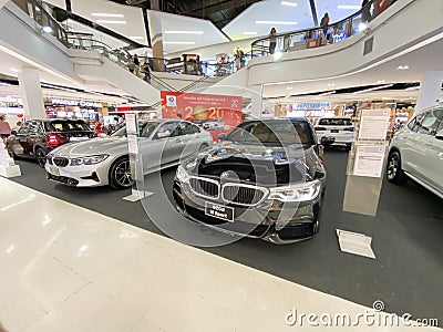 Trang, Thailand - February 2, 2020 BMW motor show in Robinson lifestyle department store. Front view of BMW 5, 3 series sedan 520d Editorial Stock Photo