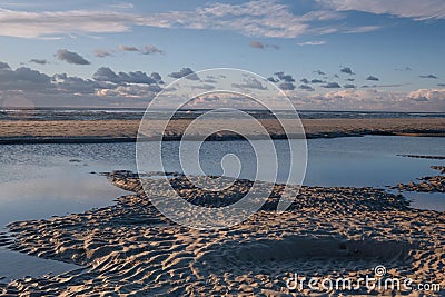 Tranquil colorful sunset over sea, viewed from the dutch coast. The Netherlands Stock Photo