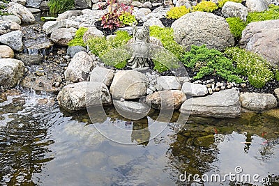 Tranquil Garden and Pond Stock Photo