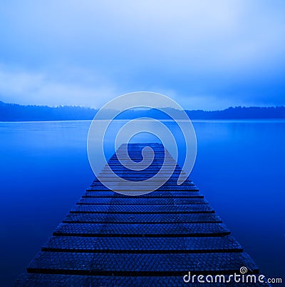 Tranquil Peaceful Lake with Jetty Stock Photo