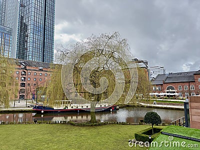 Tranquil scene of a peaceful river in the park Deansgate-Castlefield, Manchester, United Kingdom Editorial Stock Photo