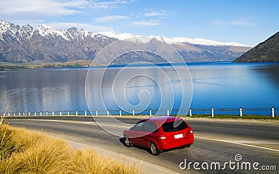 Tranquil Scenery Of Mountain Range Beyond The Road Stock Photo
