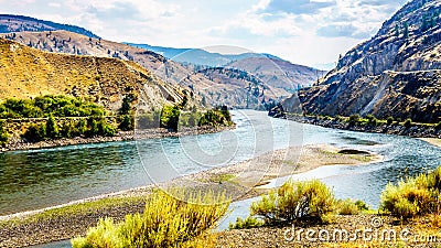 The Trans Canada Highway winding through the mountains and along the Thompson River Stock Photo