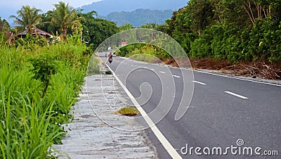 The Trans Papua Road is located in Masni District, Manokwari, West Papua Province. Stock Photo