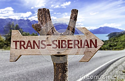Trans-Siberian wooden sign with a railway on background Stock Photo