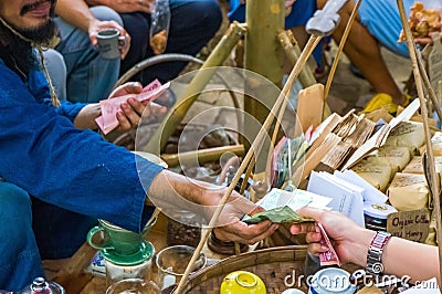A transaction in a street market Editorial Stock Photo