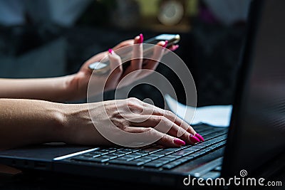 Transactions on your mobile phone and laptop. Stock Photo