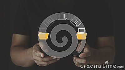 Transfer files data system relocation concept. Person hand using mobile smartphone with data folder file Stock Photo