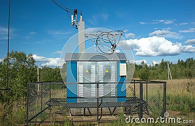 Transformer of rural power supply line in countrys Stock Photo