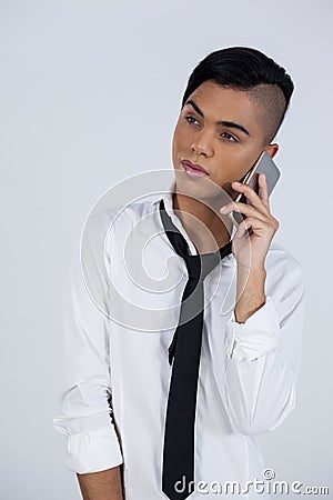 Transgender female using smart phone Stock Photo