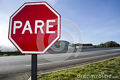 Red plate stop PARE transit sign Stock Photo