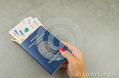 Translation: Mercosur, Federative Republic of Brazil, Passport and Uruguayan pesos, pandemic travel concept Stock Photo