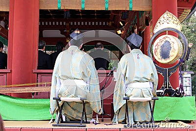 Translation: Shinto priests leading a wedding ceremony, at Tusurgaoka Shrine Editorial Stock Photo