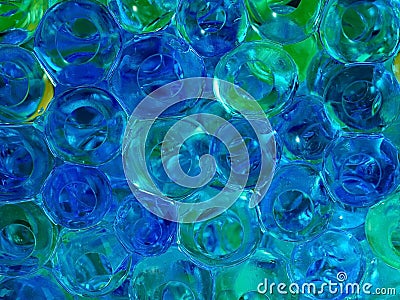 Translucent blue and yellow glass beads Stock Photo