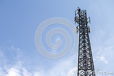 transmitter atop a cell phone pole About to be upgraded from 4g to 5g. High-risk electrical engineer job in Thailand Stock Photo