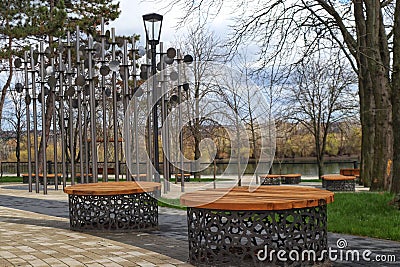 Transnistria, Bendery - March 20, 2024: Round benches in Oktyabrsky Park on the embankment of the Dniester River Editorial Stock Photo
