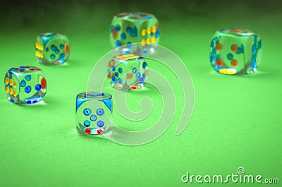 Transparent cubes for casino/transparent cubes for casino on a green cloth. Copy space Stock Photo